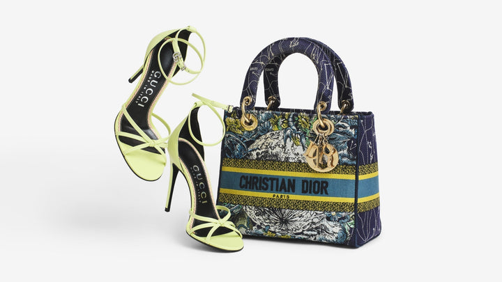 A Christian Dior Canvas Embroidered Zodiac Book Tote Blue Multicolor and a pair of Nappa Charlotte GG Ankle Strap High Heel Sandals in Pistachio Green