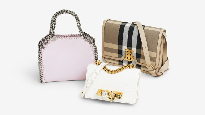 Stella McCartney, Burberry, and Alexander McQueen bags arranged in the center