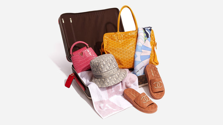 ultra-luxury must-haves to pack with you on vacation including designer luggage, tote bags, hates, bags and shoes by FASHIONPHILE