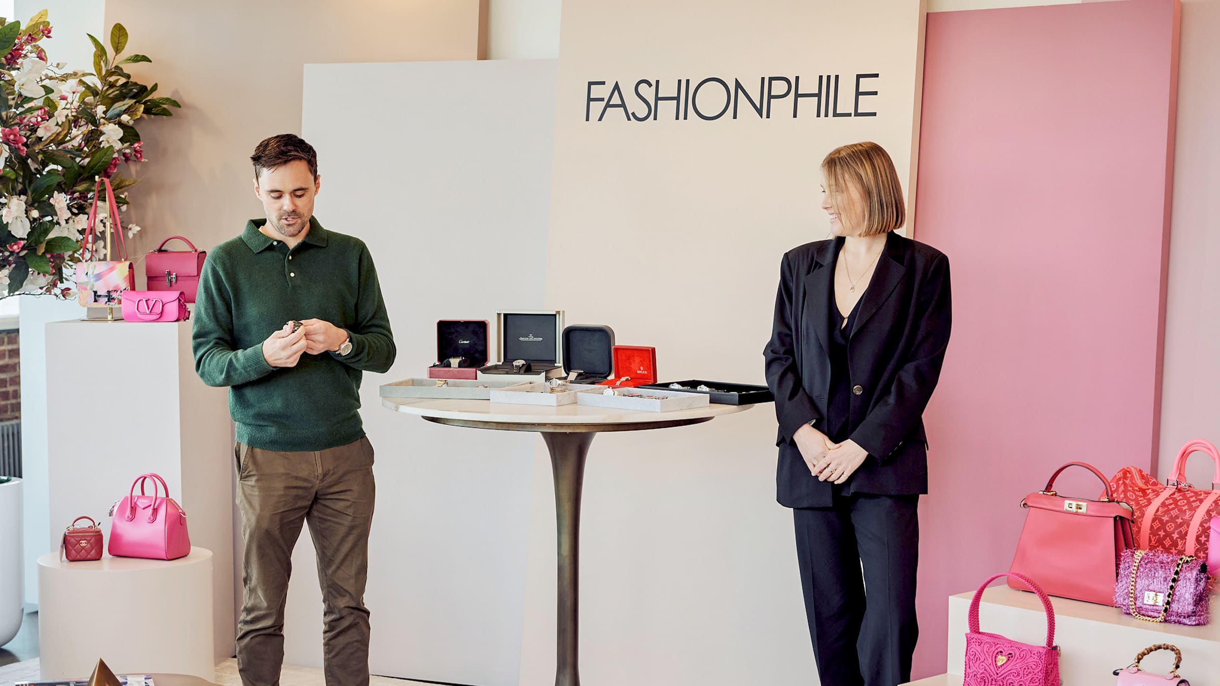 fashionphile watchmaker sam genson with brynn wallner of dimepiece at the NYC Flagship in chelsea walking about luxury watches