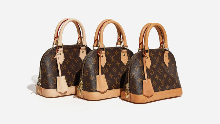 Three louis vuitton monogram alma bb bags side by side showcasing the different levels of patina and wear by fashionphile