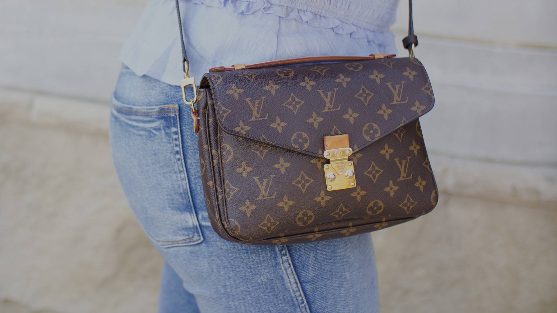 lifestyle image of louis vuitton monogram pochette metis FASHIONPHILE