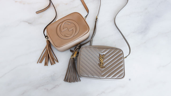 comparing popular bags like the gucci soho disco and saint laurent lou camera bag by FASHIONPHILE