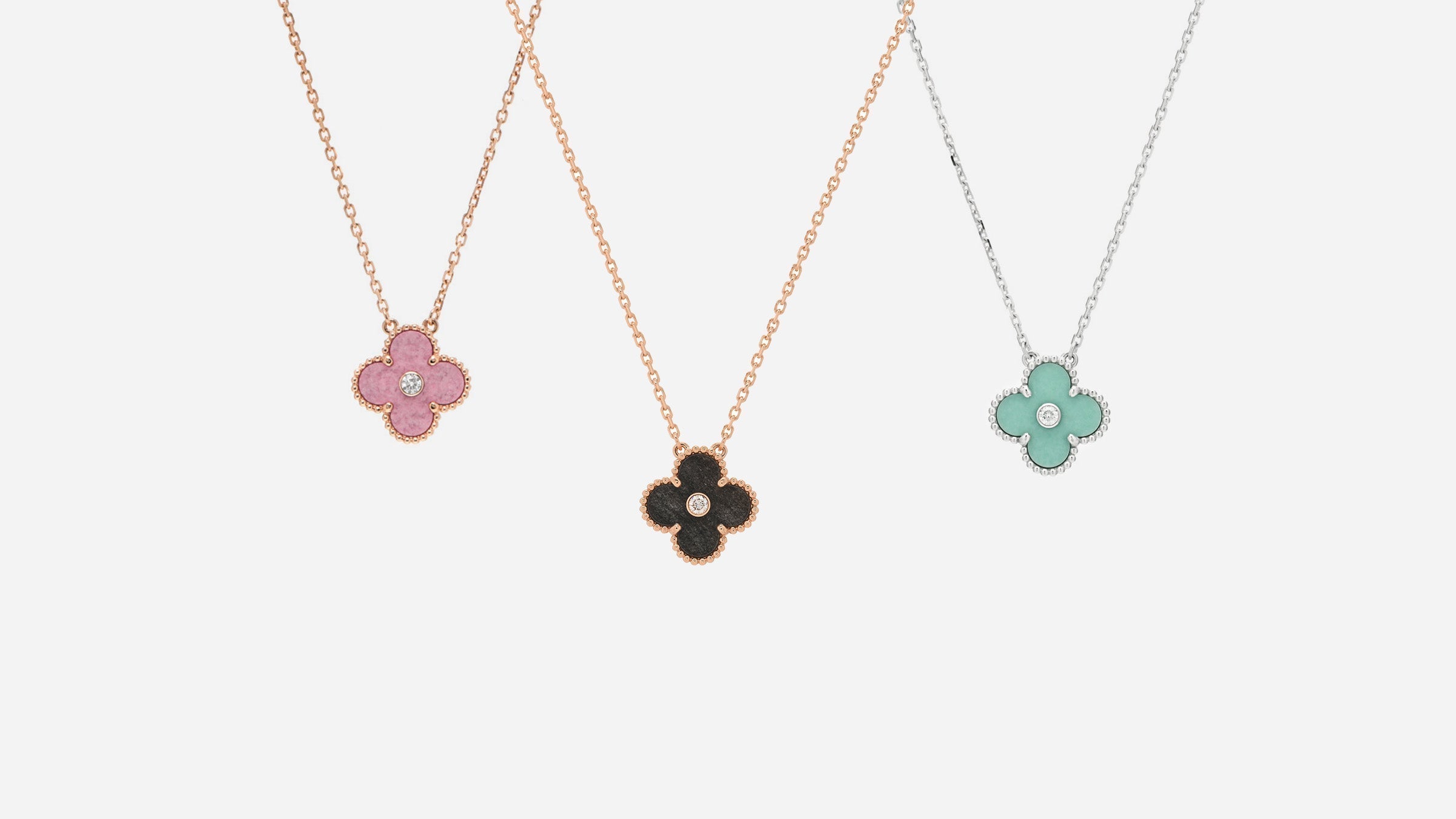 three van cleef and arpels alhambra holiday pendant necklaces from 2023, 2022, and 2021 by FASHIONPHILE