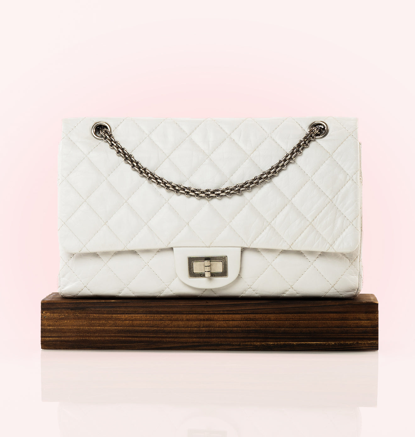 image of white chanel reissue bag FASHIONPHILE