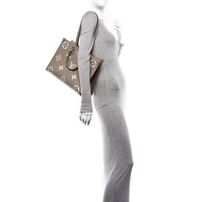 Louis Vuitton Empreinte Monogram Giant Onthego MM Tourterelle Creme 2 of 14
