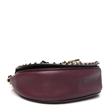 Valentino Garavani Pebbled Calfskin Rockstud Crossbody Saddle Bag Rubin 4 of 9