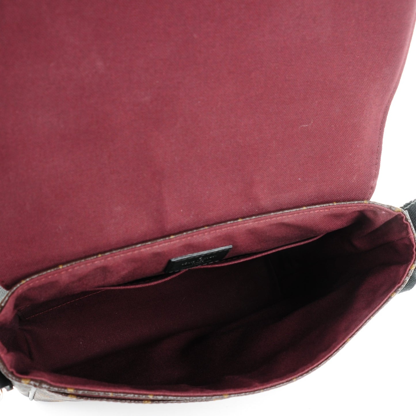 Monogram Macassar District PM