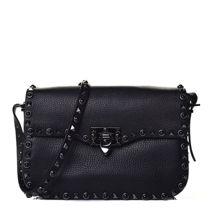Valentino Garavani Pebbled Calfskin Onyx Medium Rockstud Rolling Flap Saddle Bag Black 1 of 8