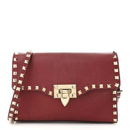 Valentino Garavani Pebbled Calfskin Medium Rockstud Flip Lock Crossbody Bag Rubin 1 of 10
