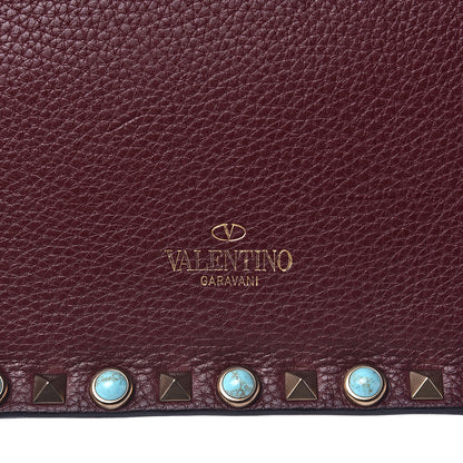 Valentino Garavani Pebbled Calfskin Rockstud Rolling Wristlet Clutch Rubin 9 of 11