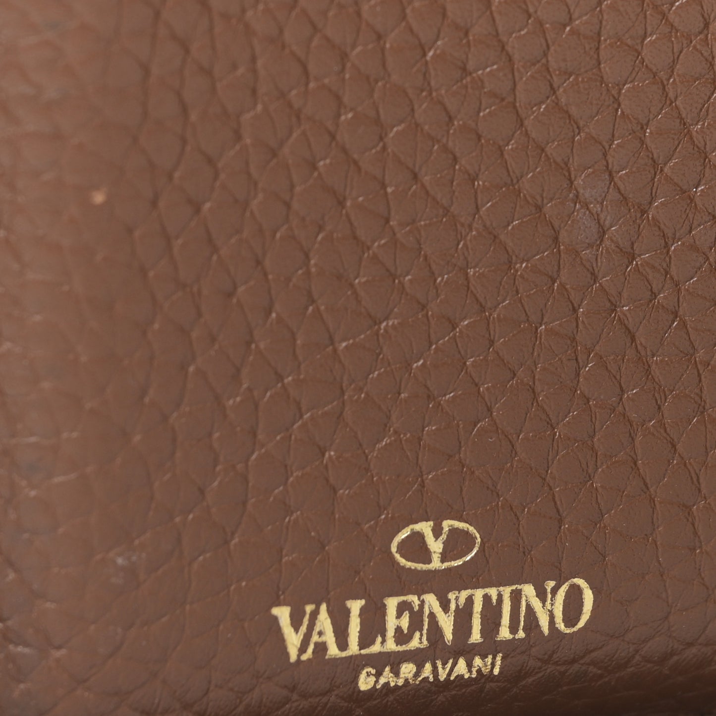 Pebbled Calfskin Rockstud Compact Zip Around Wallet Bright Cognac