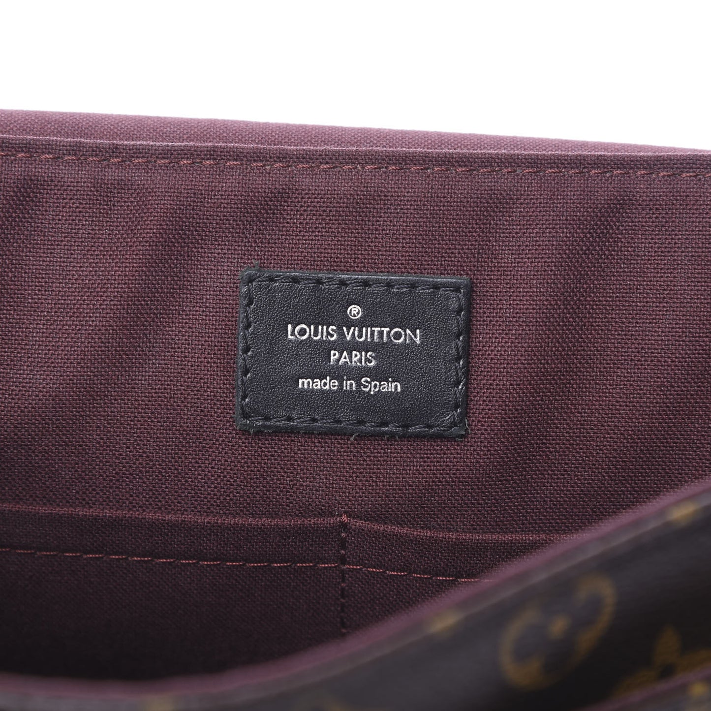 Monogram Macassar District PM