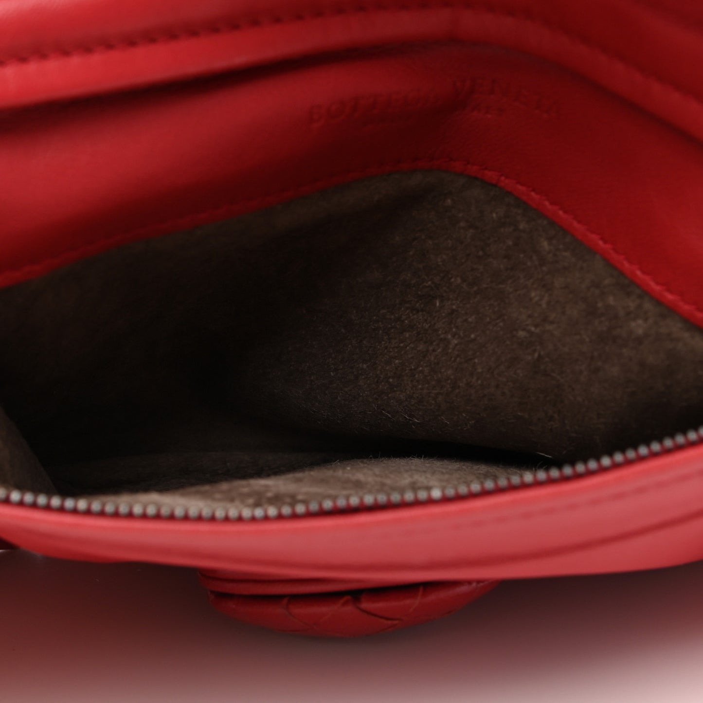 Nappa Intrecciato Turnlock Clutch Blood