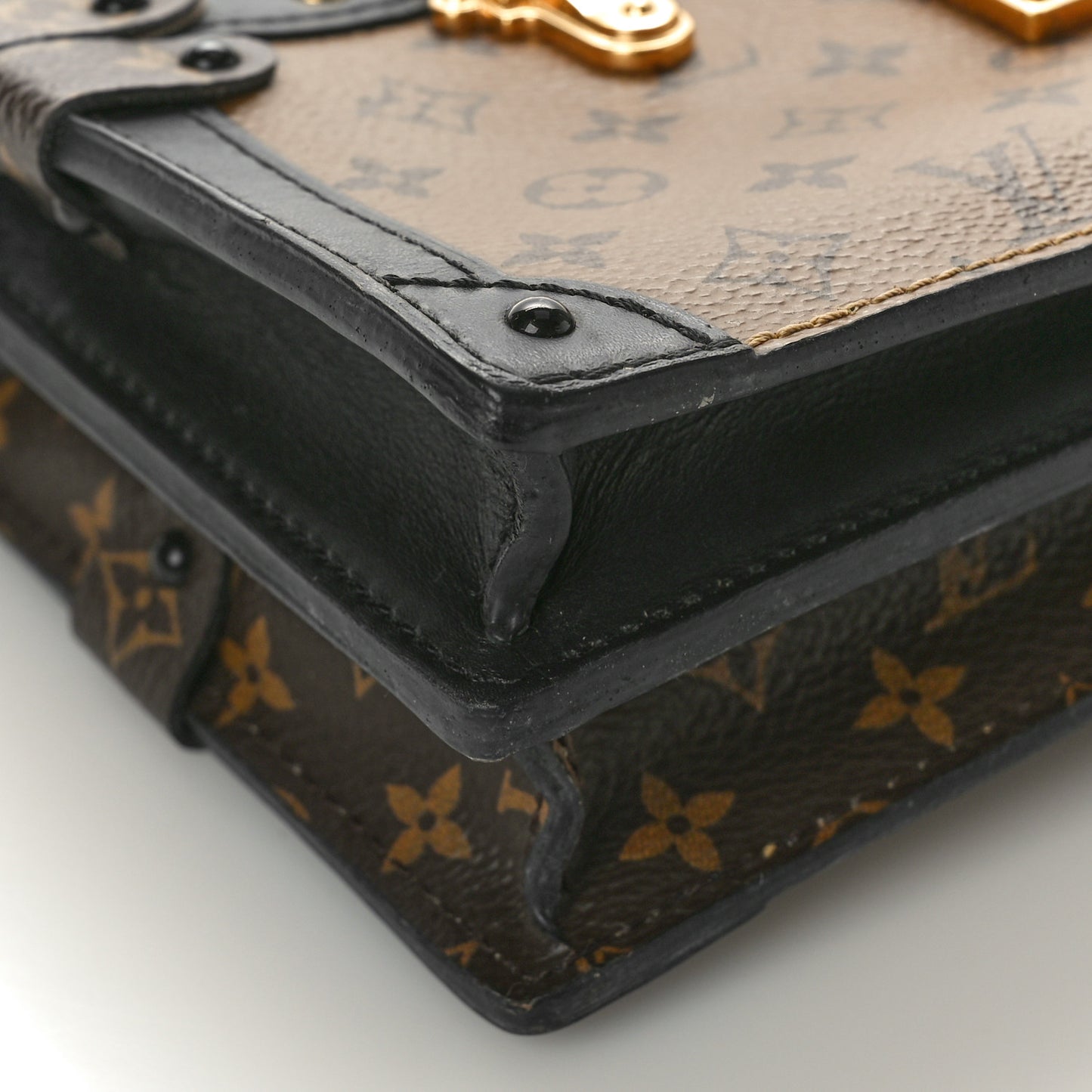 Reverse Monogram Trunk Clutch