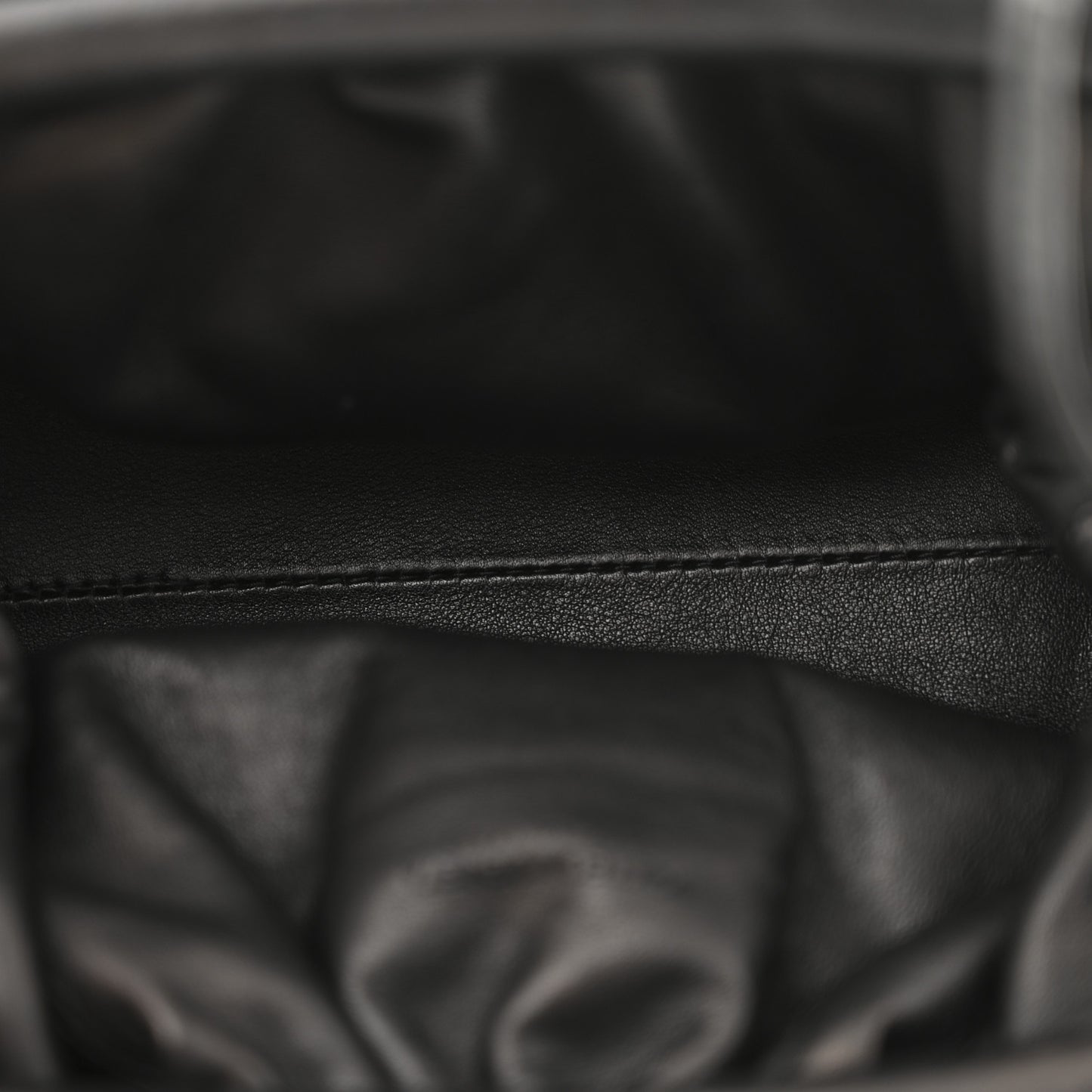 Butter Calfskin The Mini Pouch Black