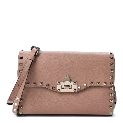 Valentino Garavani Pebbled Calfskin Medium Rockstud Flip Lock Crossbody Bag Skin Sorbet 1 of 8