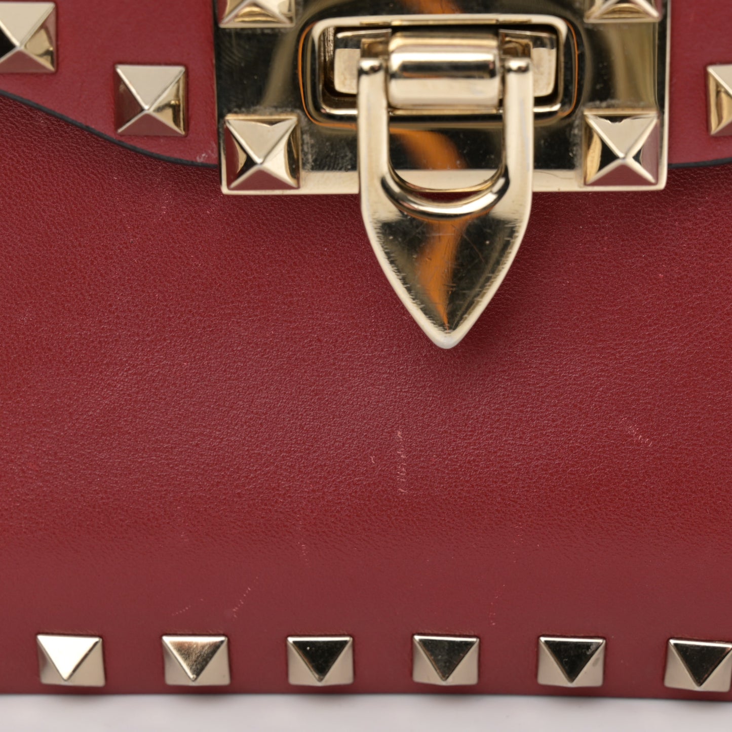 Vitello Small Rockstud Flap Saddle Bag Red