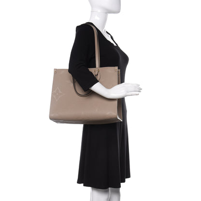 Louis Vuitton Empreinte Monogram Giant Onthego MM Tourterelle 2 of 10