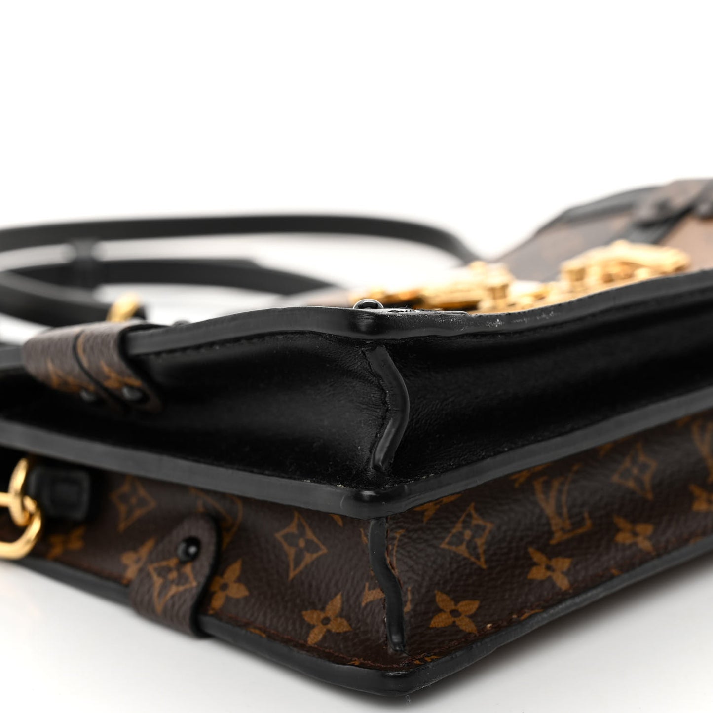 Reverse Monogram Trunk Clutch