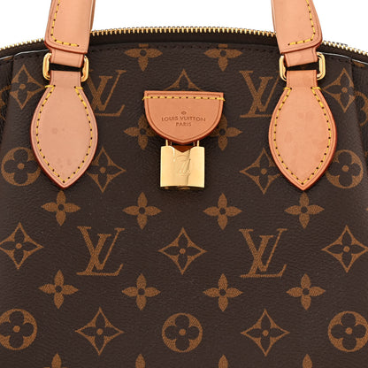 Louis Vuitton Monogram Rivoli PM 7 of 10