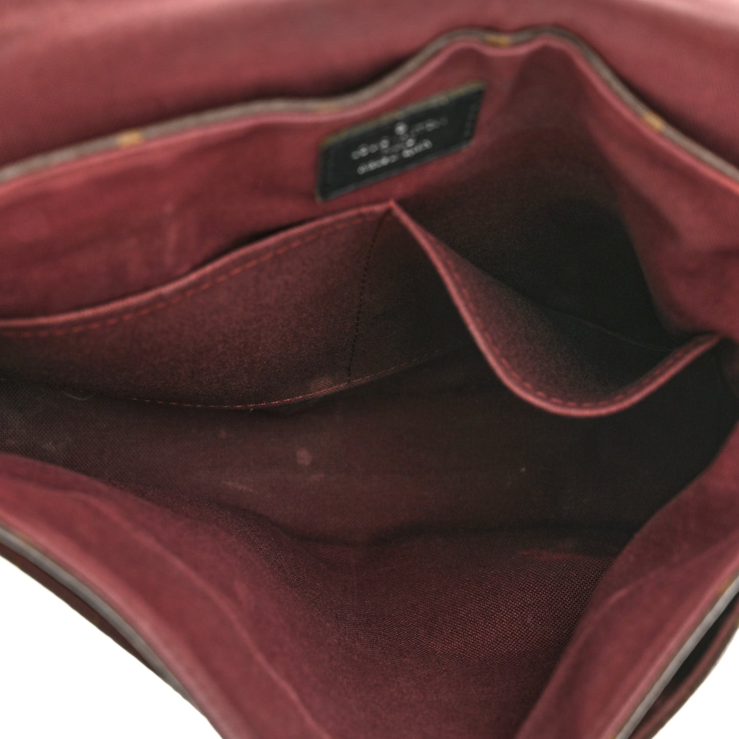 Monogram Macassar District PM