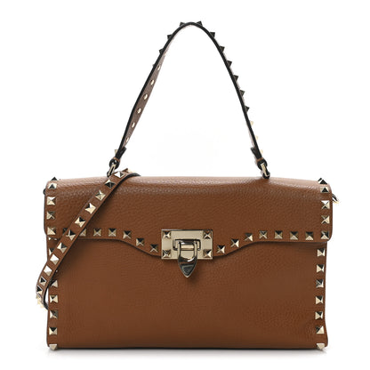 Valentino Garavani Pebbled Calfskin Medium Rockstud Top Handle Shoulder Bag Cognac 1 of 9
