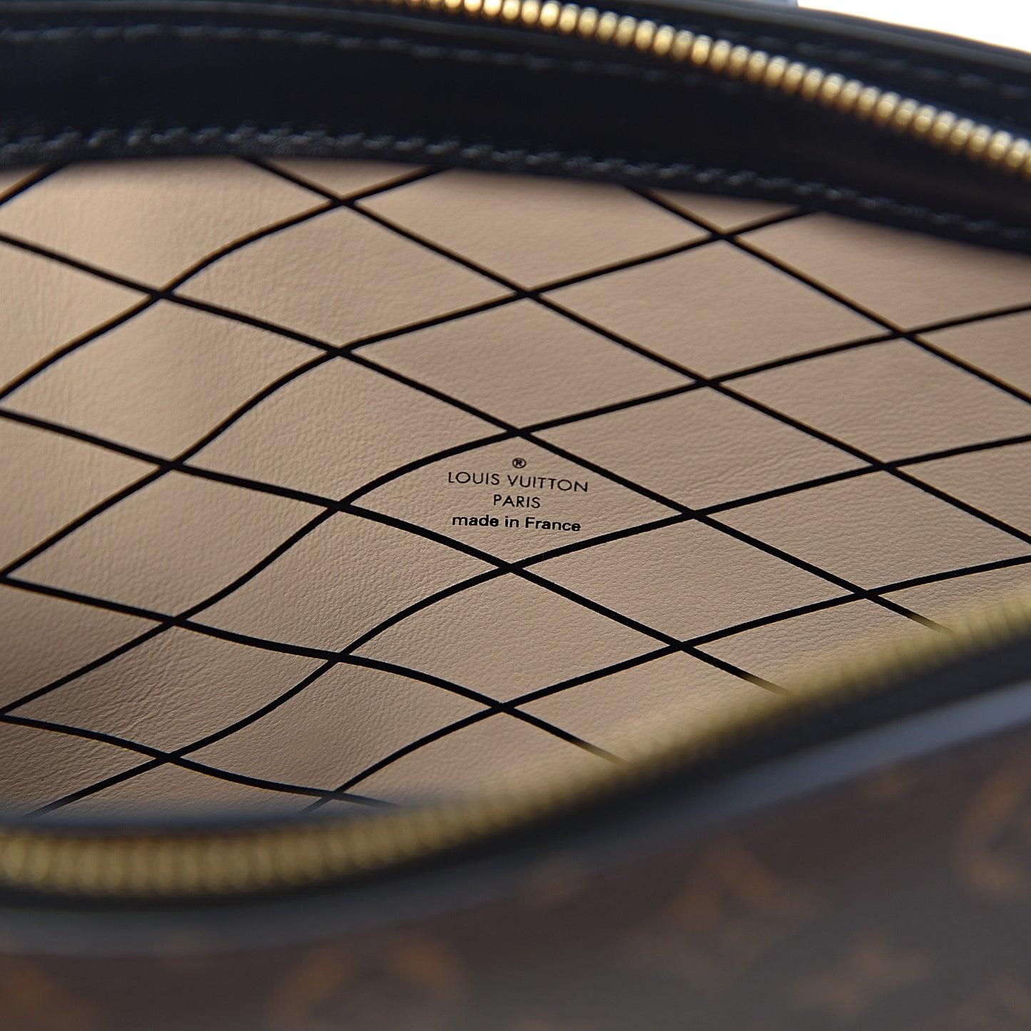 Reverse Monogram Trunk Clutch