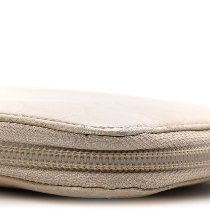 Chanel Lambskin Camellia Embossed Zip Around Organizer Wallet Light Beige 11 of 23