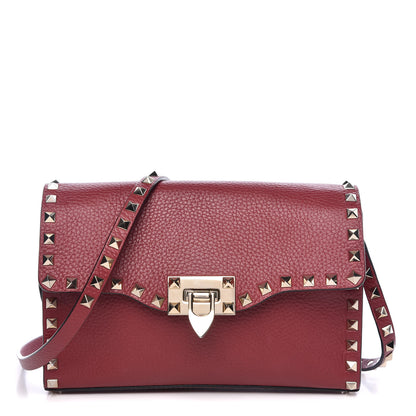 Valentino Garavani Pebbled Calfskin Medium Rockstud Flip Lock Crossbody Bag Red 1 of 10