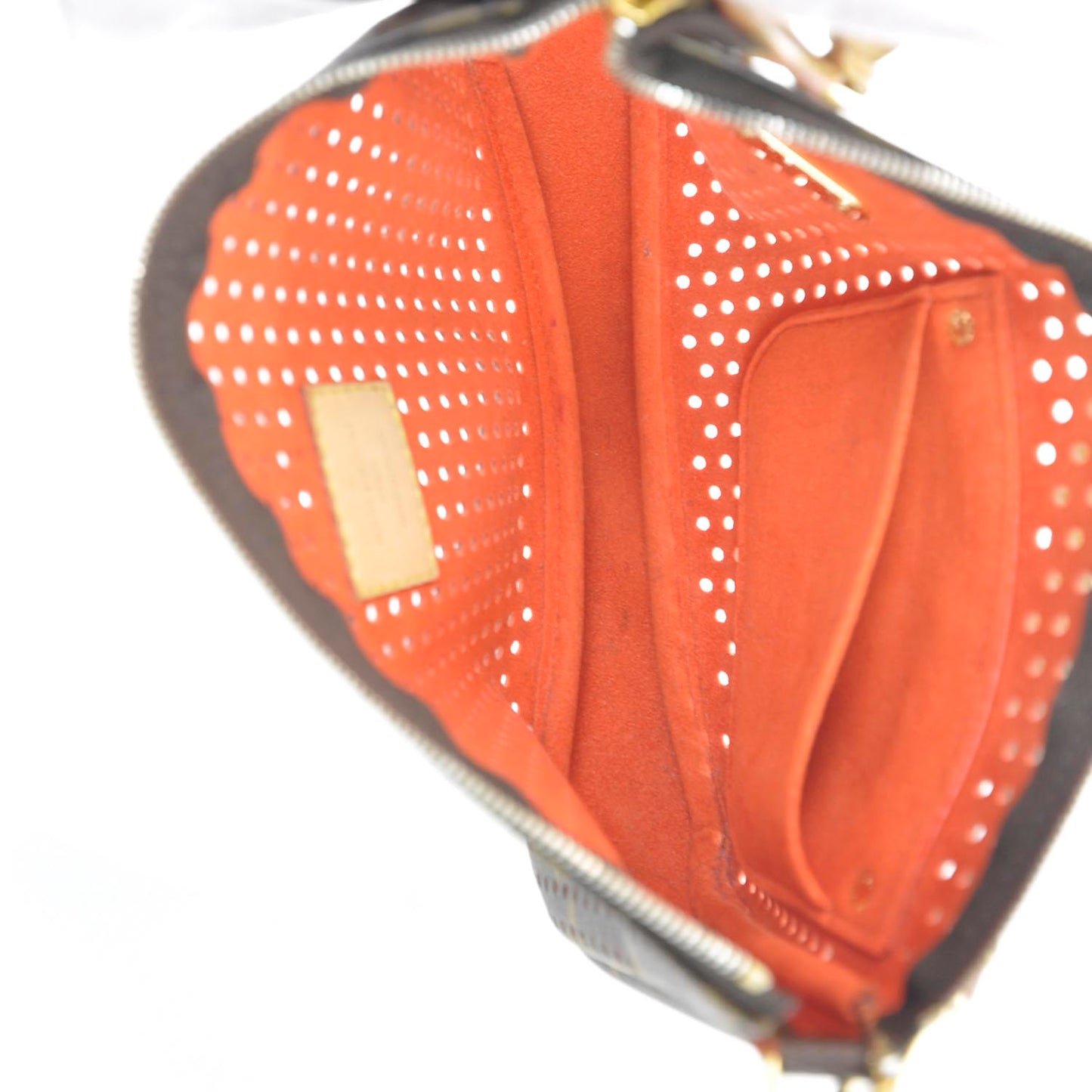 Monogram Perforated Pochette Accessories Bag Orange