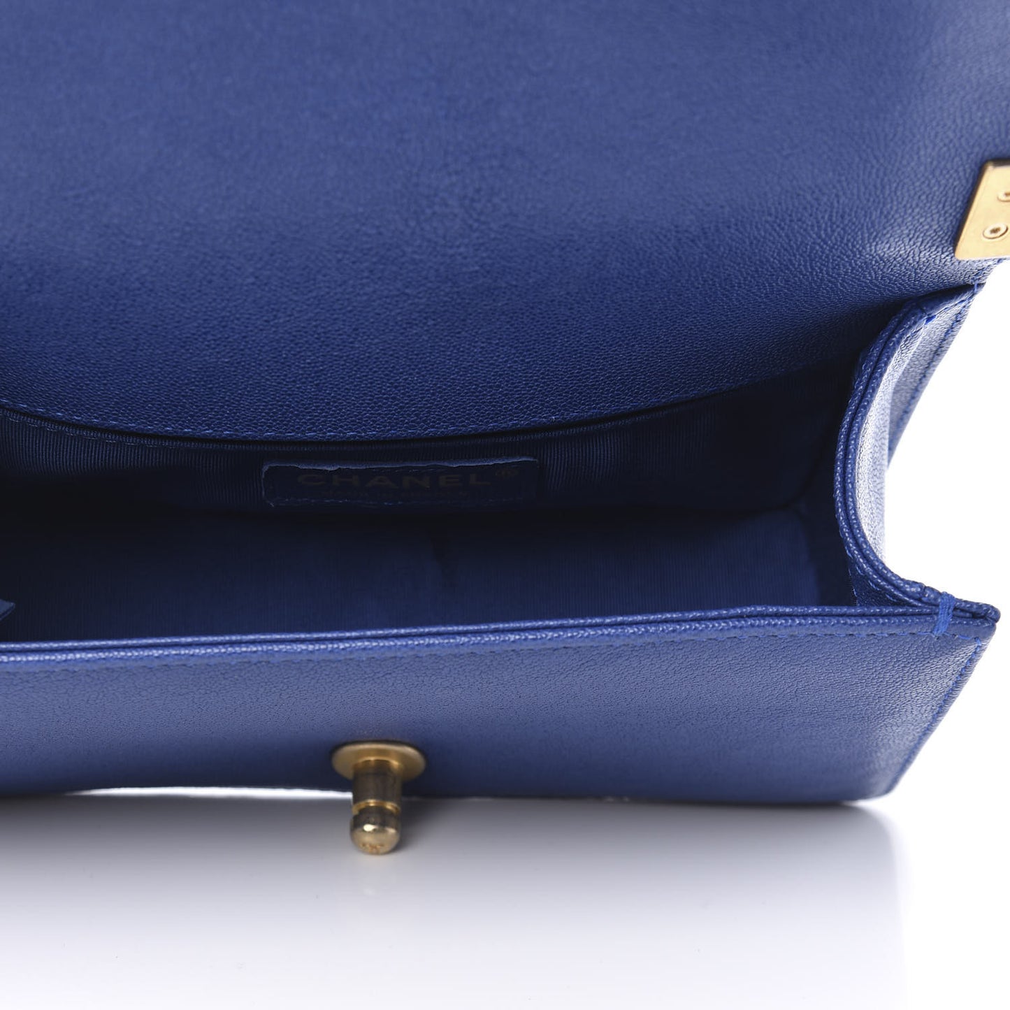 Caviar Quilted Small Boy Flap Dark Blue