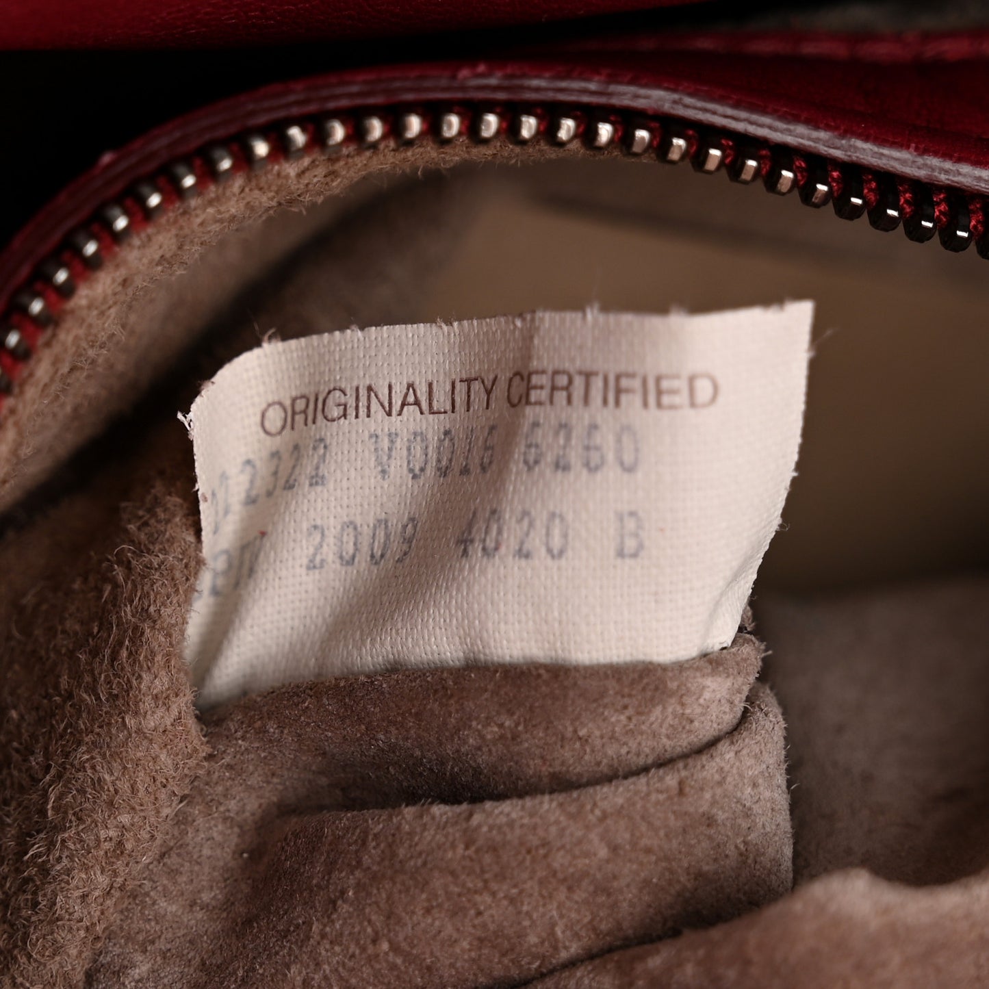 Nappa Intrecciato Parachute Bag Cassis