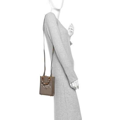 Fendi Vitello King Plexiglass Elaphe Python Print Logo Mini Fendi Sunshine Shopper Tote Tartufo Daisy Roccia 2 of 10