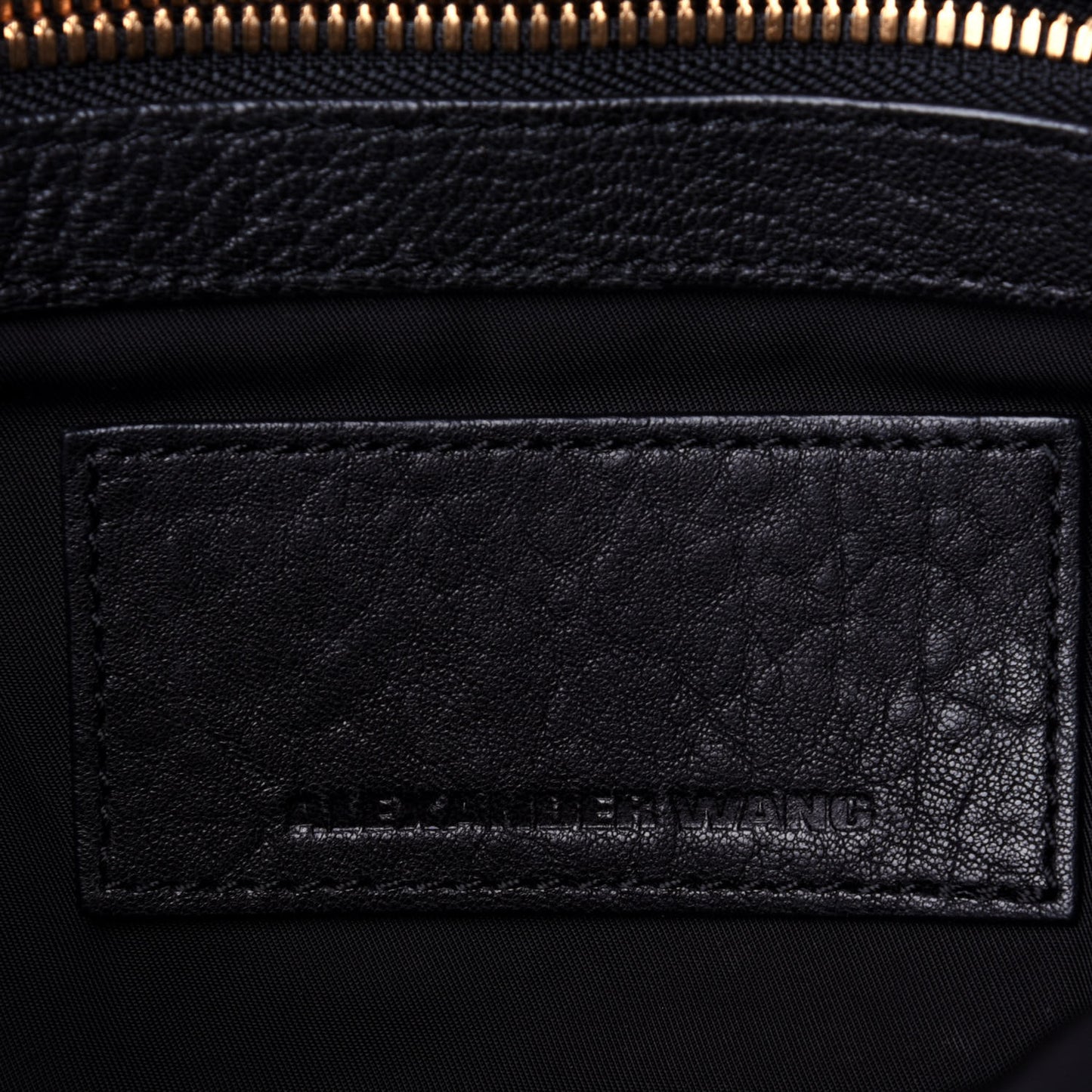 Pebbled Lambskin Lia Sling Black