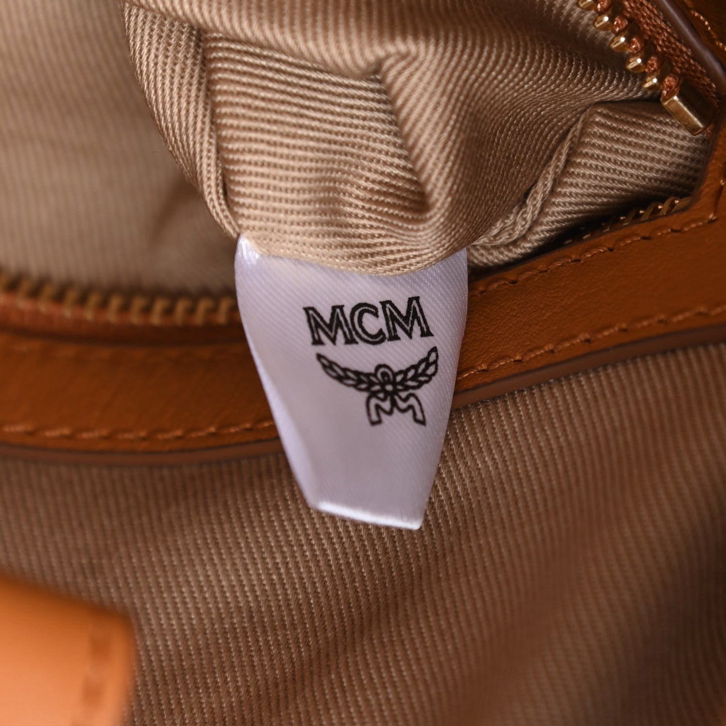 Calfskin Ottomar Monogram Essential Bucket Cognac