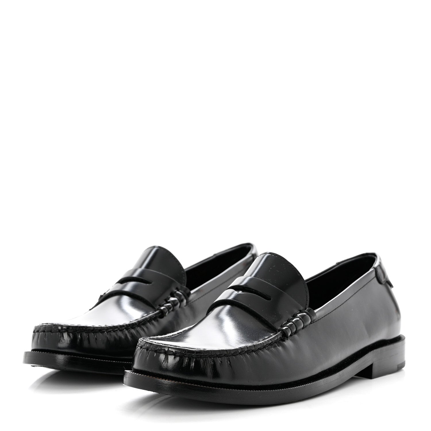 side view of SAINT LAURENT Calfskin Penny Loafers in the color Black by FASHIONPHILE