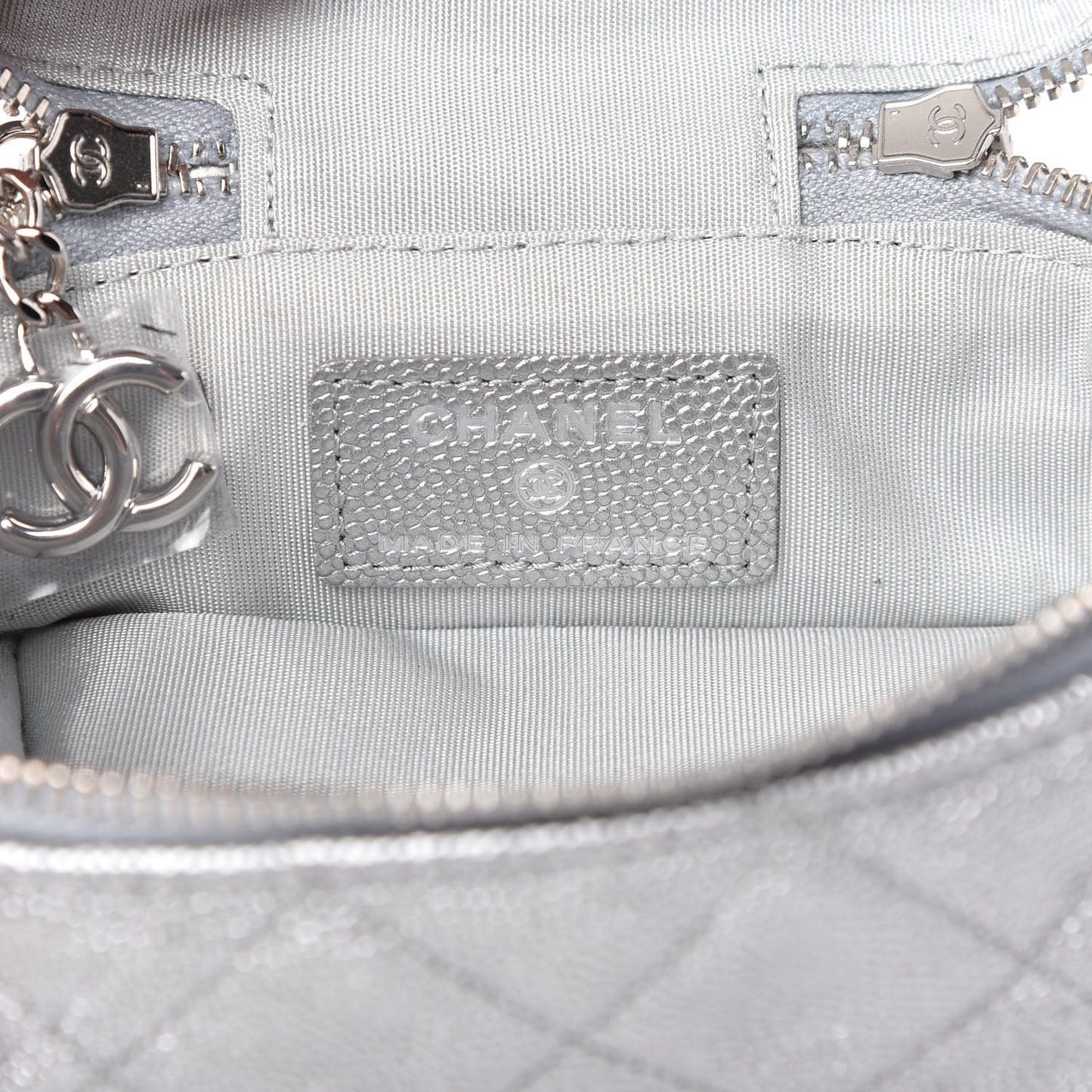 Metallic Caviar Quilted Mini Top Handle Vanity With Chain Silver