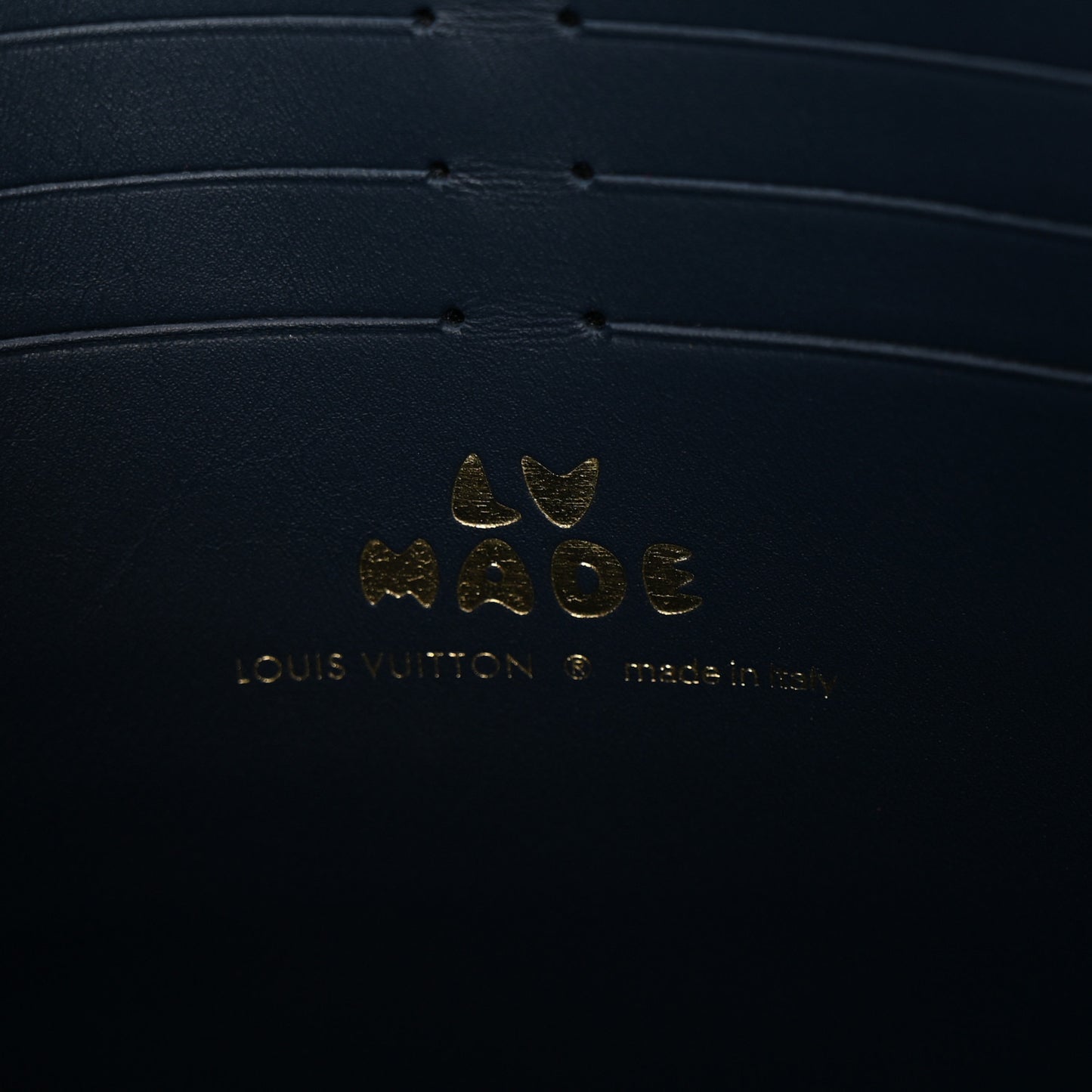 X NIGO Taurillon Monogram Denim Drip Pochette Voyage MM Blue