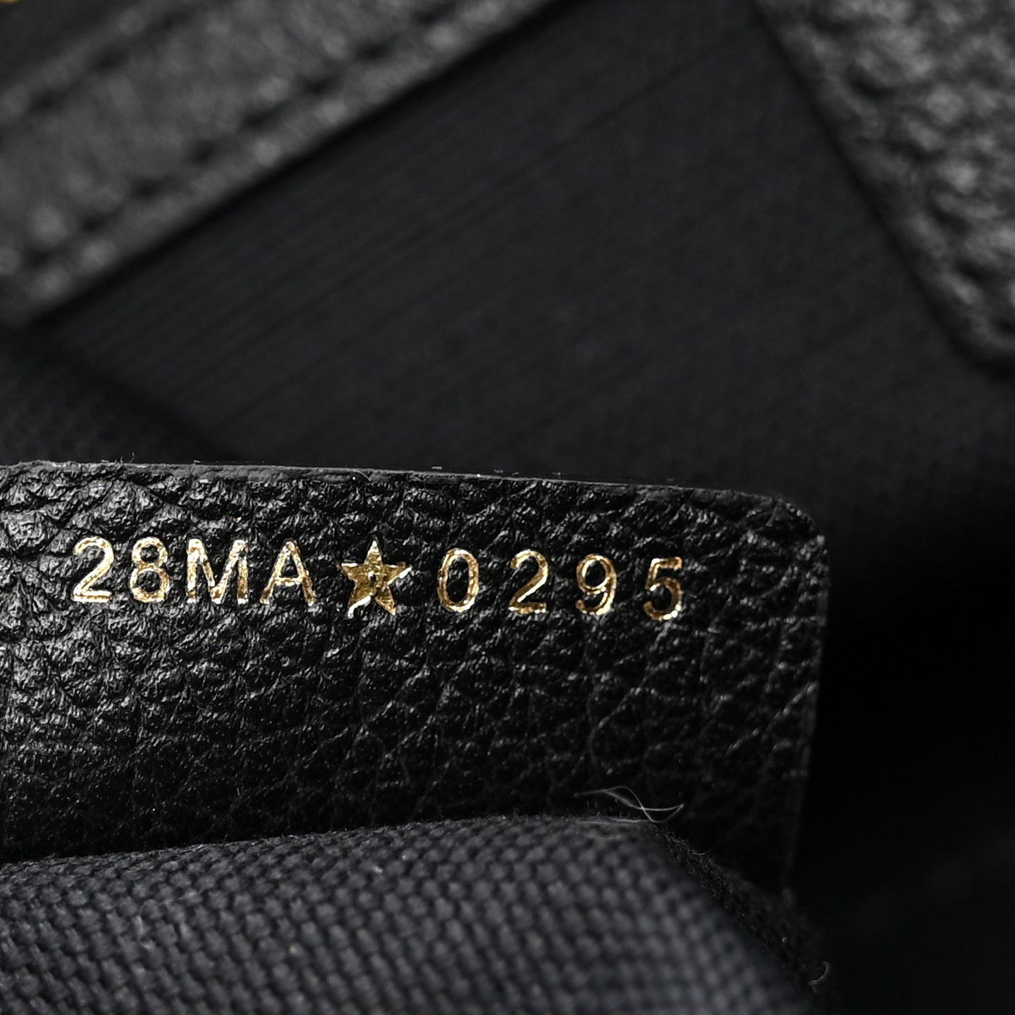 Grained Calfskin Flat Macrocannage Medium Voyage Bag Black