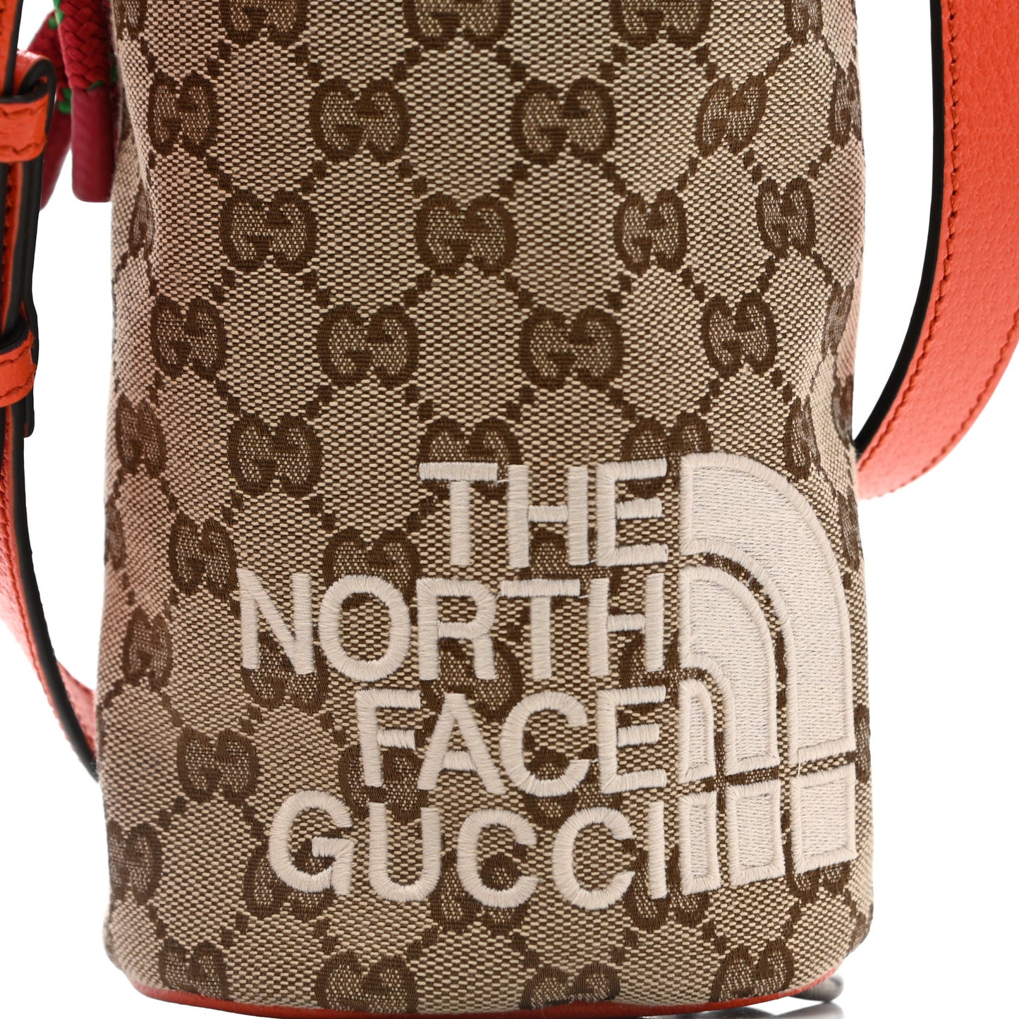X THE NORTH FACE Monogram Textured Dollar Calfskin Barrel Shoulder Bag Beige Ebony Mystic White Deep Orange