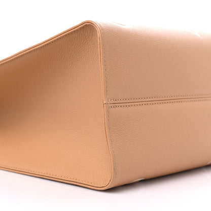 Louis Vuitton Empreinte Monogram Giant Onthego MM Arizona Creme 7 of 9