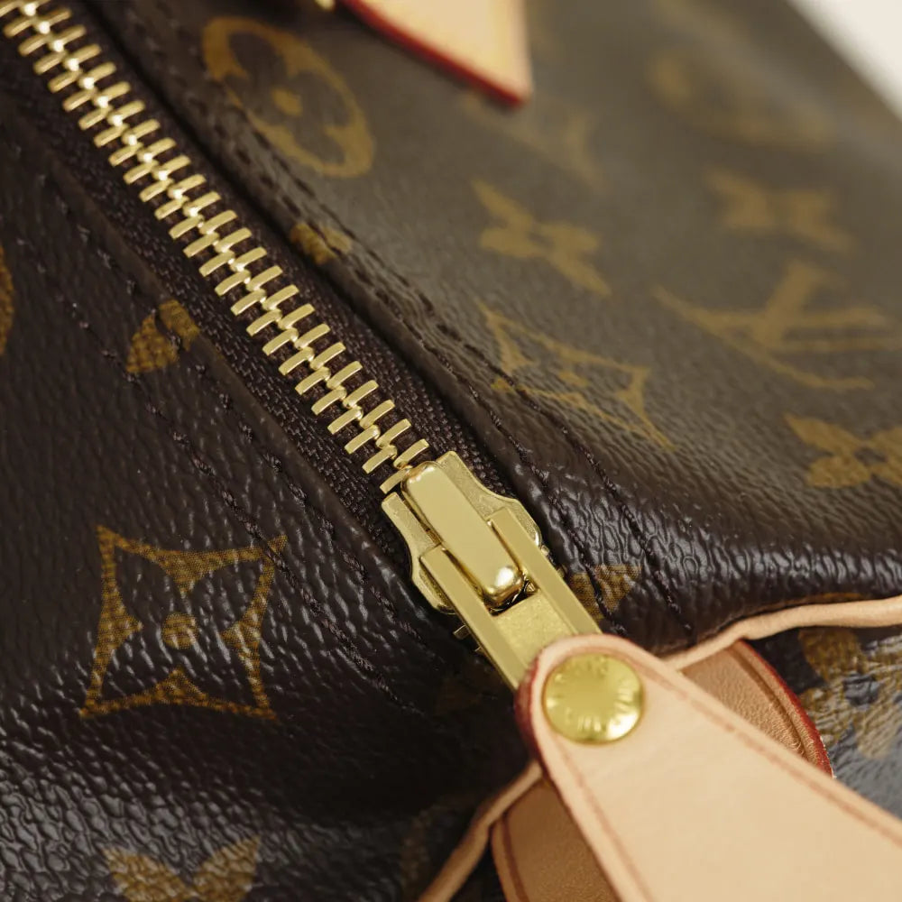 A zipper slider on an authentic Louis Vuitton Speedy