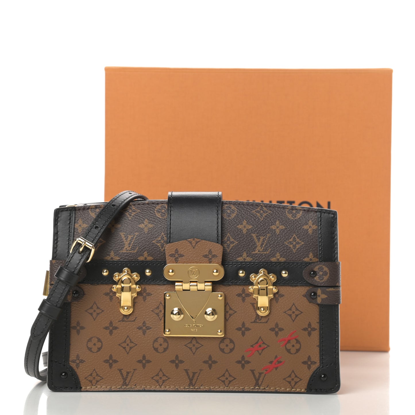 Reverse Monogram Trunk Clutch