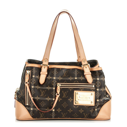 Louis Vuitton Monogram Riveting 1 of 7