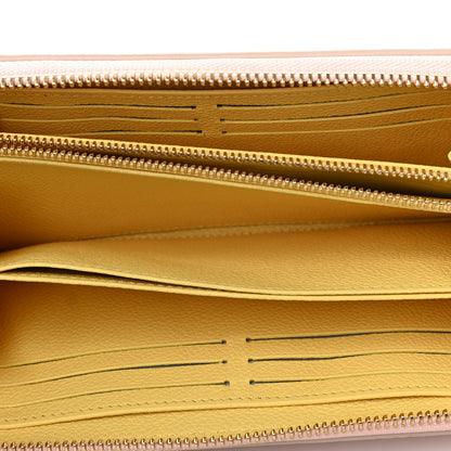 Louis Vuitton Empreinte Monogram Spring in the City Zippy Wallet Pink Beige Yellow 4 of 9