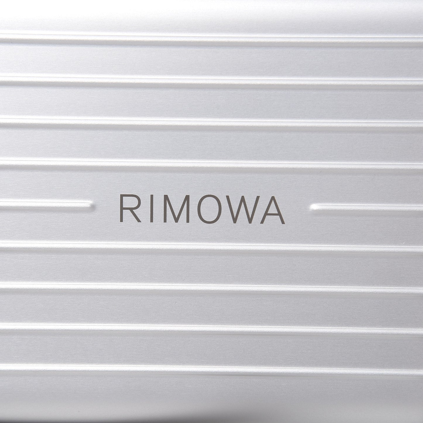 X RIMOWA Aluminum Personal Clutch On Strap Silver