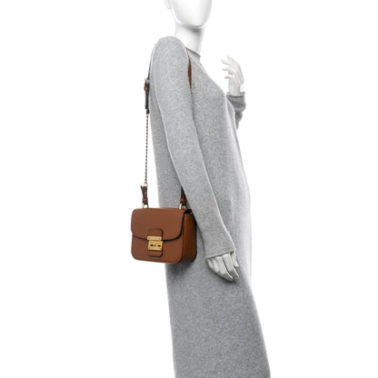 Miu Miu City Calf Lock Shoulder Bag Cognac 2 of 9