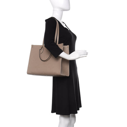 Louis Vuitton Empreinte Monogram Giant Onthego MM Tourterelle 2 of 10