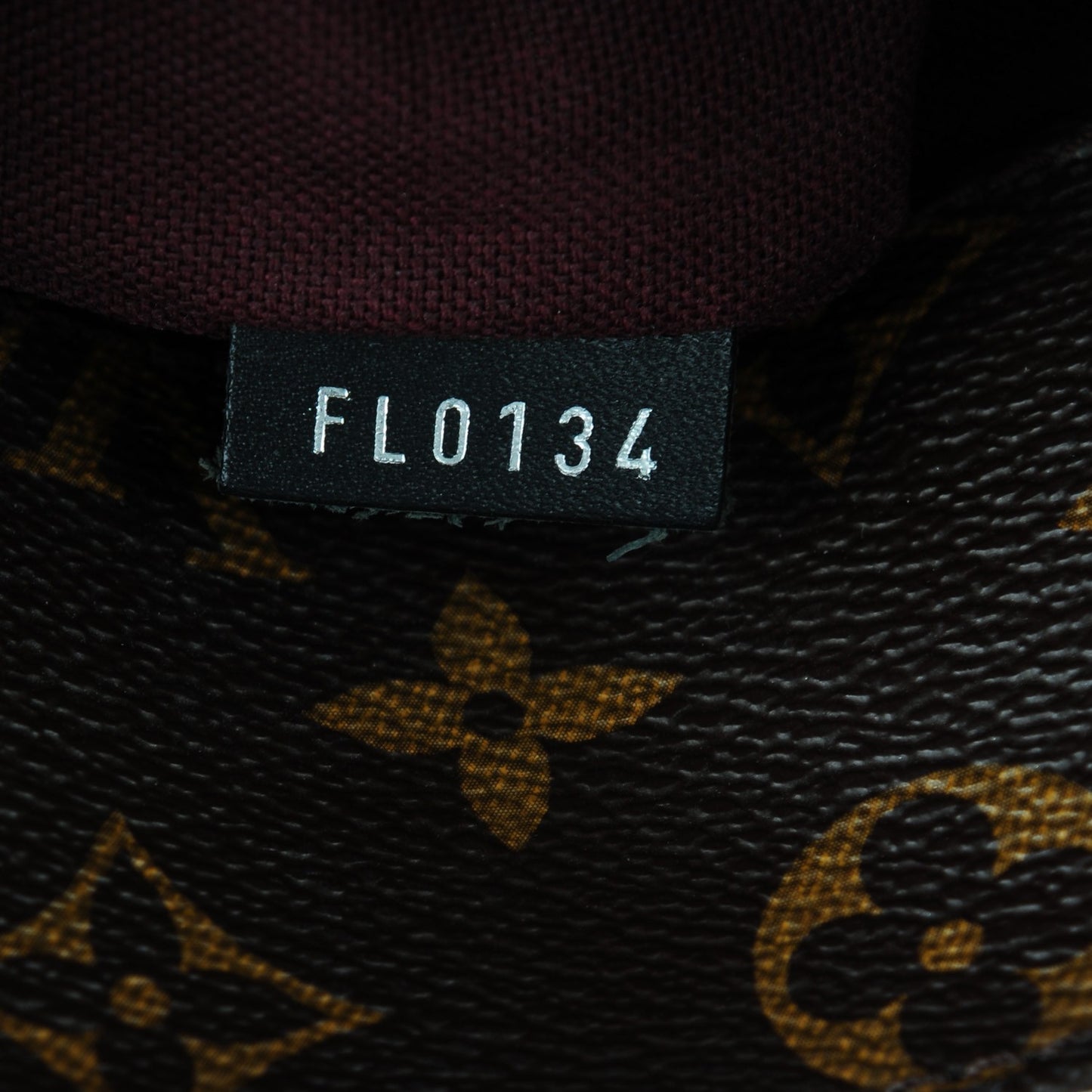 Monogram Macassar District PM